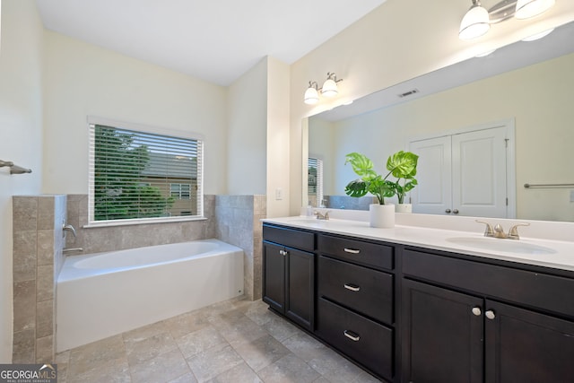 3231 Chutney Ct, Avondale Estates, GA 30002 - full bathroom with a garden tub, a sink, double vanity, and visible vents