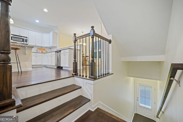3231 Chutney Ct, Avondale Estates, GA 30002 - stairs with recessed lighting, baseboards, and wood finished floors