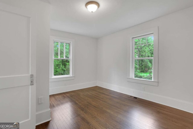 3223 Cleveland Hwy, Gainesville, GA 30506 - empty room with dark wood-type flooring and baseboards
