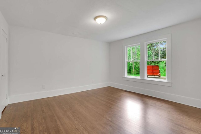 3223 Cleveland Hwy, Gainesville, GA 30506 - spare room with wood finished floors and baseboards
