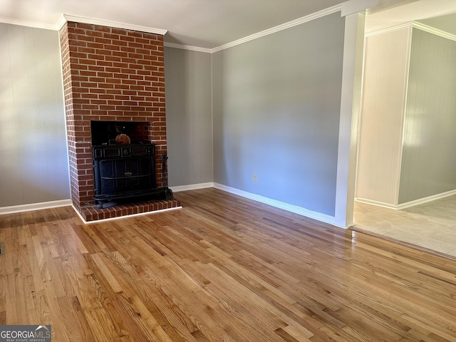 111 Howard St, Byron, GA 31008 - unfurnished living room featuring baseboards, crown molding, and wood finished floors