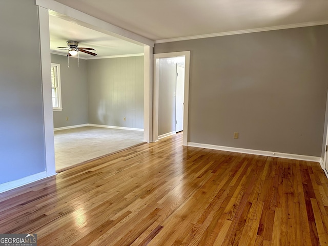 111 Howard St, Byron, GA 31008 - empty room with baseboards, ceiling fan, ornamental molding, and wood finished floors