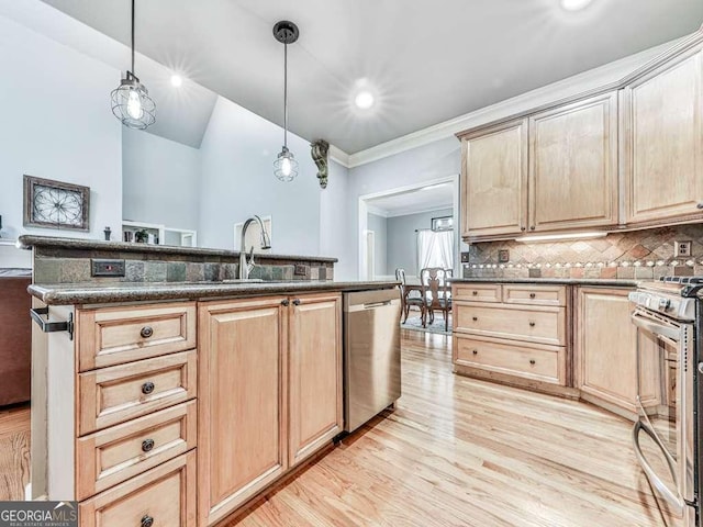 kitchen featuring pendant lighting, light brown cabinets, light wood finished floors, backsplash, and stainless steel appliances