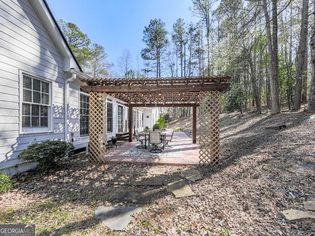 view of patio / terrace featuring a pergola