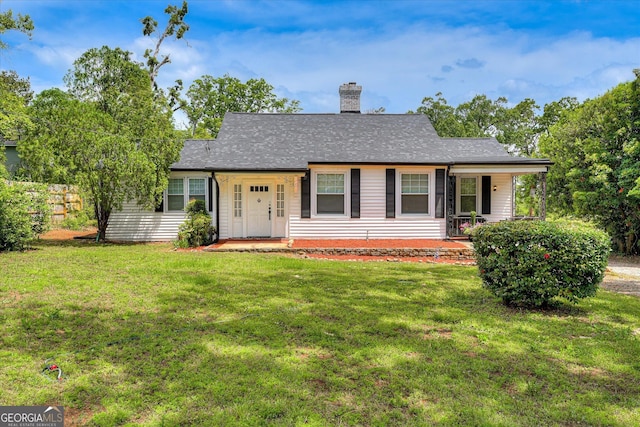 2327 Redwood Dr, Augusta, GA 30904 - view of front of home featuring a front lawn, roof with shingles, covered porch, and a chimney