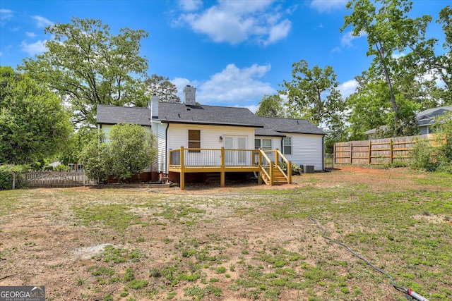 2327 Redwood Dr, Augusta, GA 30904 - rear view of property with a fenced backyard, a wooden deck, a chimney, and a yard
