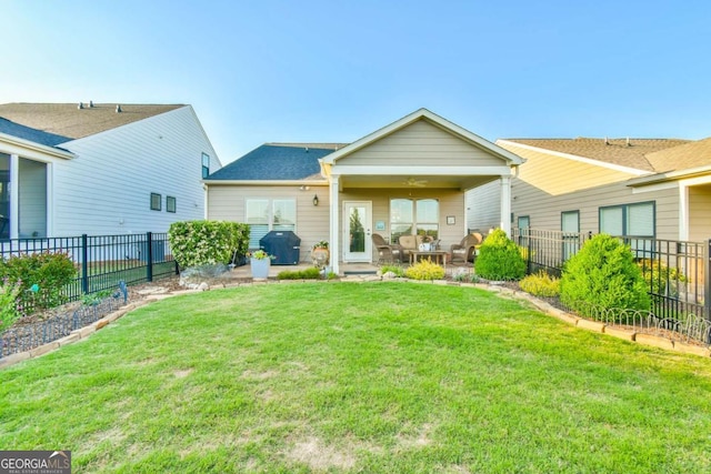 5641 Tisbury Ct, Hoschton, GA 30548 - back of house featuring a fenced backyard, a patio, and a yard