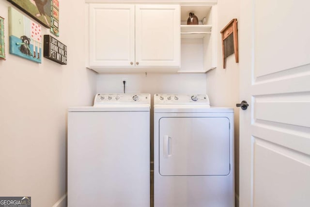 5641 Tisbury Ct, Hoschton, GA 30548 - laundry room featuring separate washer and dryer and cabinet space