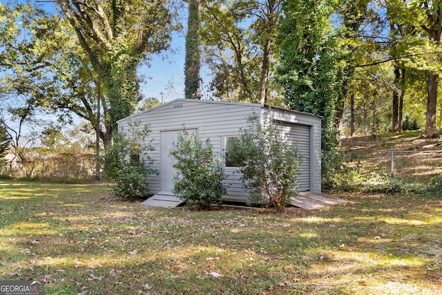 view of shed with fence