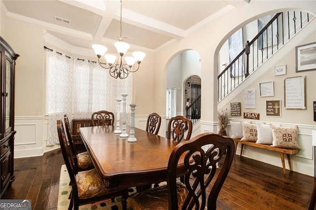 108 Telfair Ln, Mcdonough, GA 30253 - dining area featuring plenty of natural light, dark wood-style floors, a chandelier, arched walkways, and beamed ceiling