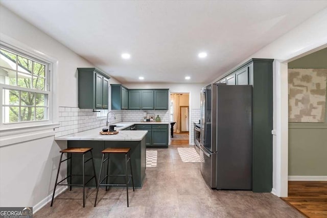 35 Saddle Mountain Rd SE, Rome, GA 30161 - living area featuring a fireplace, wood finished floors, and baseboards