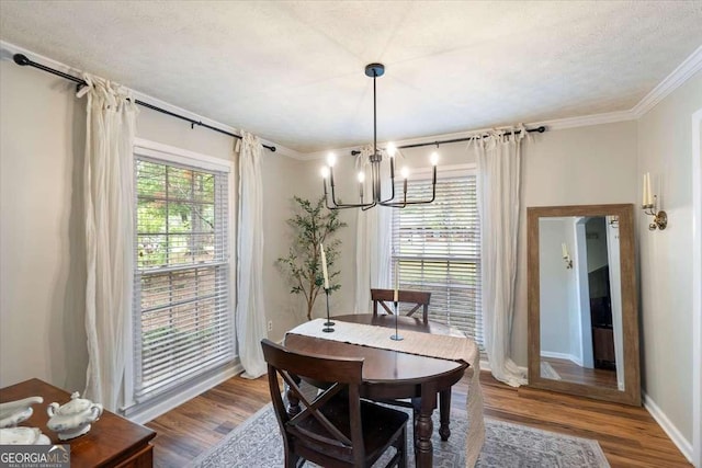 35 Saddle Mountain Rd SE, Rome, GA 30161 - kitchen featuring freestanding refrigerator, a peninsula, backsplash, a breakfast bar area, and baseboards