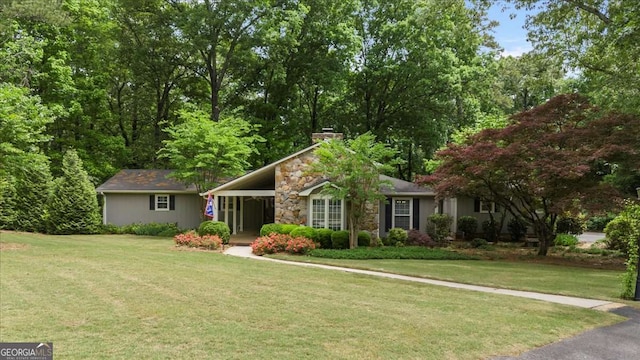 35 Saddle Mountain Rd SE, Rome, GA 30161 - view of front of property featuring a front lawn, a chimney, and stone siding