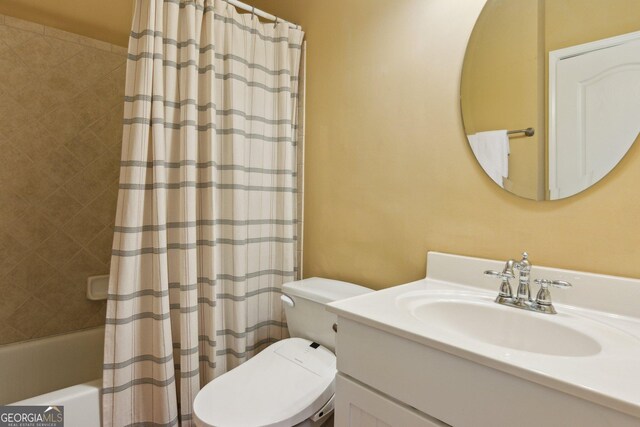 4114 Suwanee Trail Dr, Buford, GA 30518 - bathroom with vanity and shower / bath combo with shower curtain