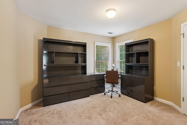office space with carpet floors and baseboards