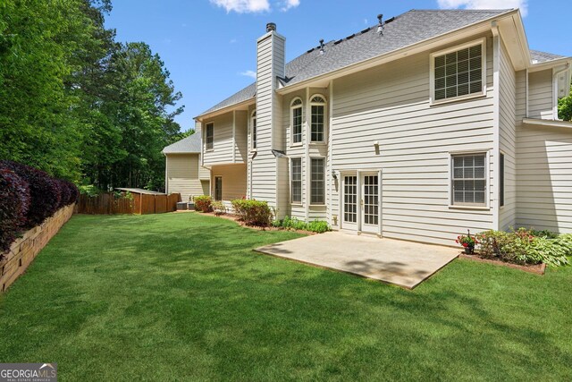 4114 Suwanee Trail Dr, Buford, GA 30518 - rear view of house with a chimney, a patio area, and a shingled roof