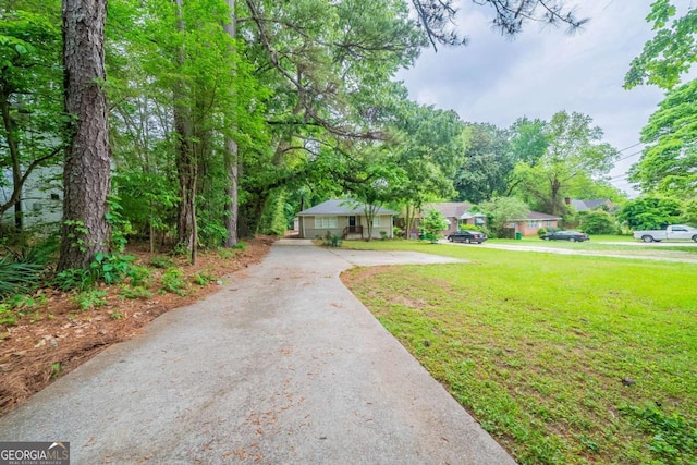 1774 Austin Dr, Decatur, GA 30032 - view of front of home with driveway and a front lawn