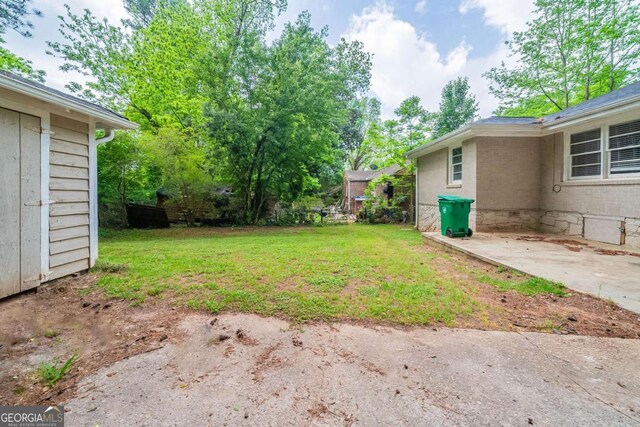 1774 Austin Dr, Decatur, GA 30032 - view of yard featuring a patio area