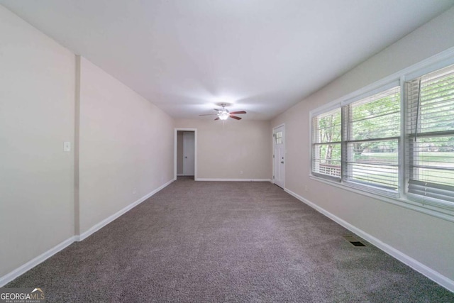 1774 Austin Dr, Decatur, GA 30032 - spare room with a ceiling fan, baseboards, visible vents, and carpet
