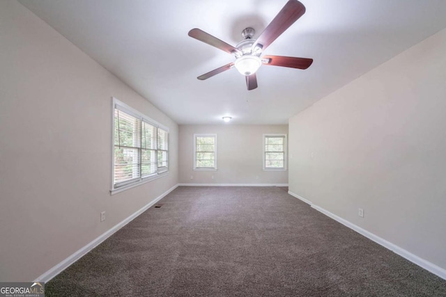 1774 Austin Dr, Decatur, GA 30032 - empty room featuring baseboards, carpet, and a ceiling fan