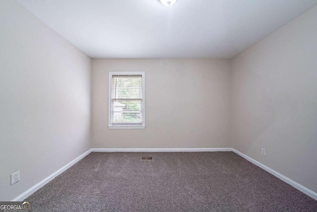 1774 Austin Dr, Decatur, GA 30032 - carpeted spare room featuring baseboards and visible vents