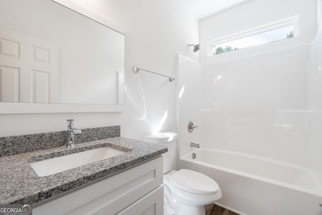 830 Dixon Dr, Gainesville, GA 30501 - bathroom featuring vanity, bathing tub / shower combination, and toilet