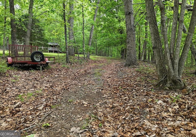 exterior space with a forest view
