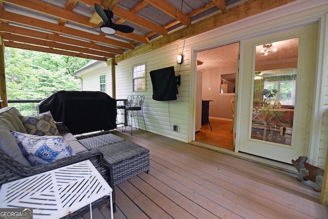 deck featuring a ceiling fan and grilling area