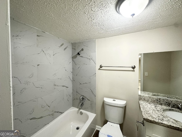 full bath with vanity, a textured ceiling, bathtub / shower combination, and toilet