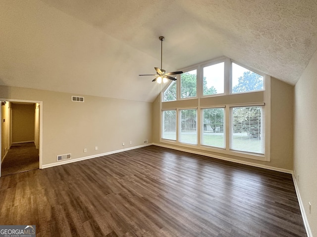 additional living space featuring visible vents, dark wood finished floors, and baseboards