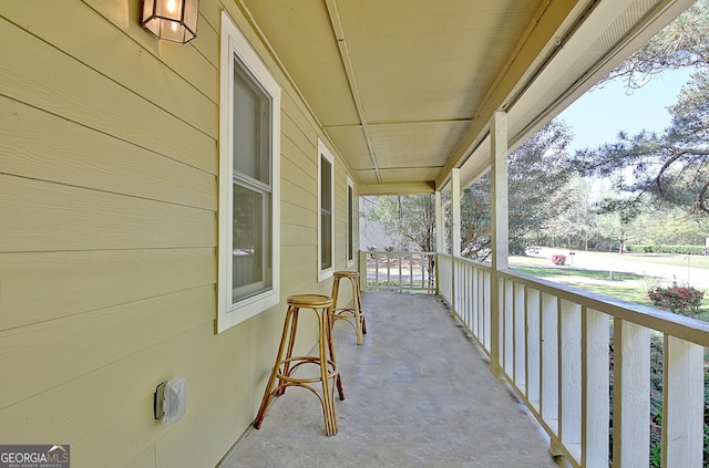balcony featuring a porch