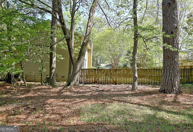 view of yard featuring fence