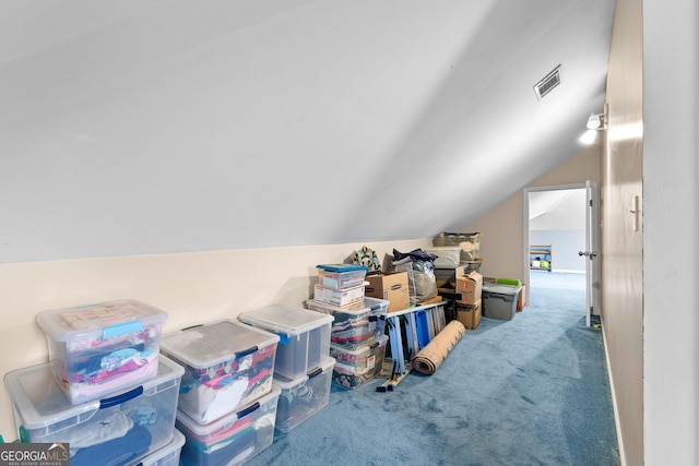 unfinished attic featuring visible vents