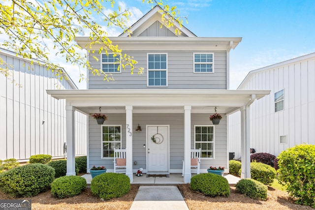 view of front facade featuring board and batten siding and a porch