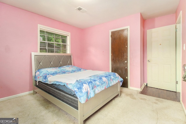 1239 Sharonton Dr, Stone Mountain, GA 30083 - carpeted bedroom with baseboards