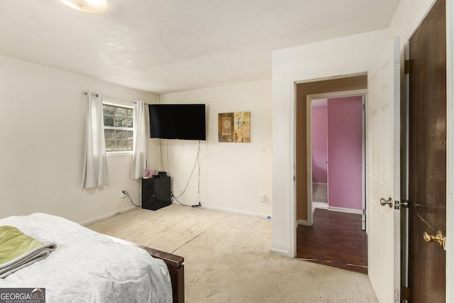 1239 Sharonton Dr, Stone Mountain, GA 30083 - bedroom with carpet floors and baseboards
