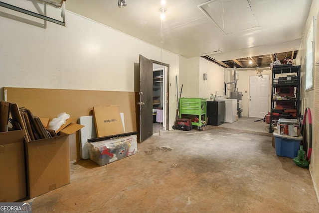 1239 Sharonton Dr, Stone Mountain, GA 30083 - garage featuring washer and clothes dryer