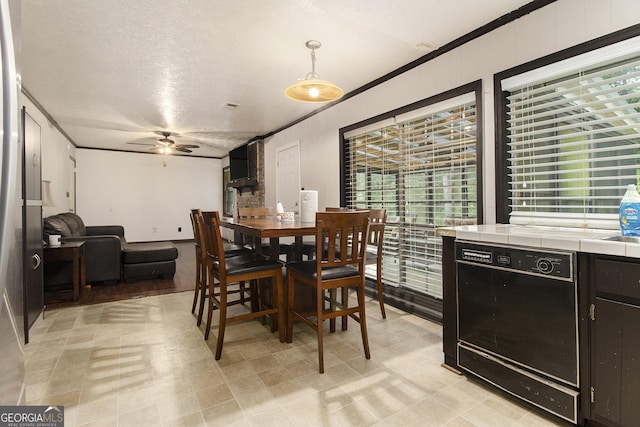 1239 Sharonton Dr, Stone Mountain, GA 30083 - dining space with ceiling fan and crown molding