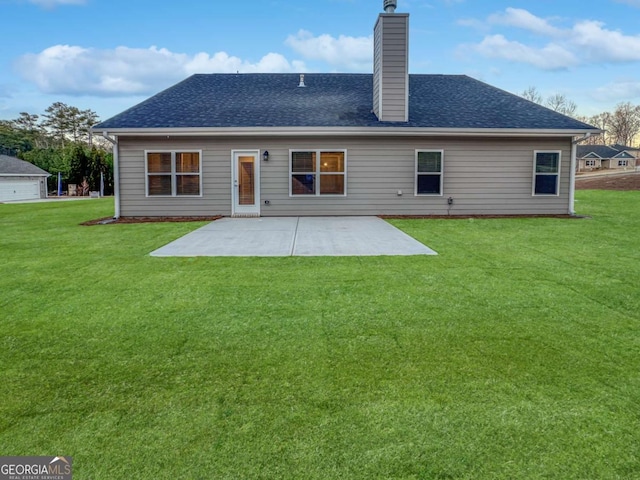 5291 Tuscany Dr, Douglasville, GA 30135 - rear view of house featuring a yard, a patio, a chimney, and a shingled roof