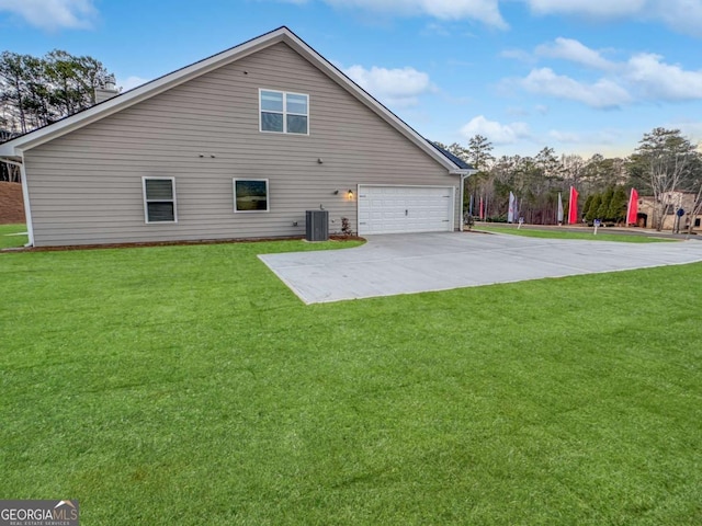 5291 Tuscany Dr, Douglasville, GA 30135 - view of property exterior featuring a garage, central AC unit, concrete driveway, and a yard