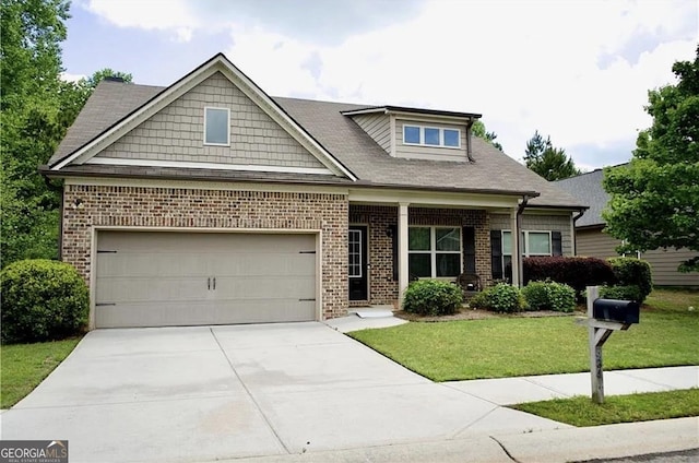 584 Amaranth Trl, Hoschton, GA 30548 - craftsman inspired home with brick siding, concrete driveway, a front yard, and a garage