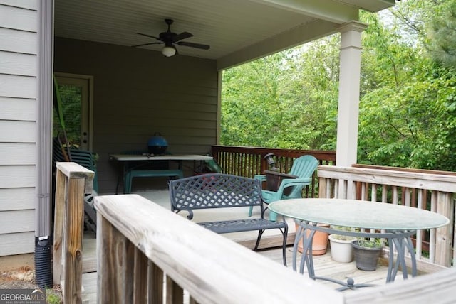 584 Amaranth Trl, Hoschton, GA 30548 - wooden deck featuring ceiling fan and outdoor dining area