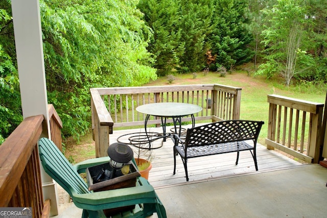 584 Amaranth Trl, Hoschton, GA 30548 - wooden terrace with outdoor dining space