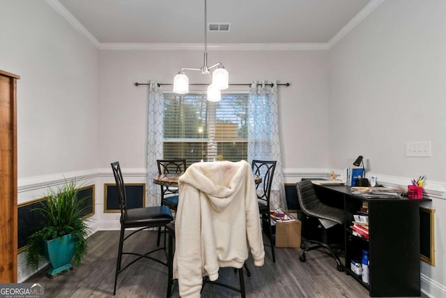 dining area featuring ornamental molding, wood finished floors, and visible vents