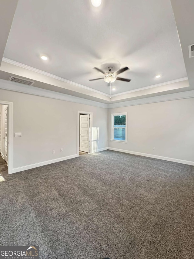 5331 Tuscany Dr, Douglasville, GA 30135 - unfurnished room featuring a ceiling fan, baseboards, a tray ceiling, visible vents, and ornamental molding