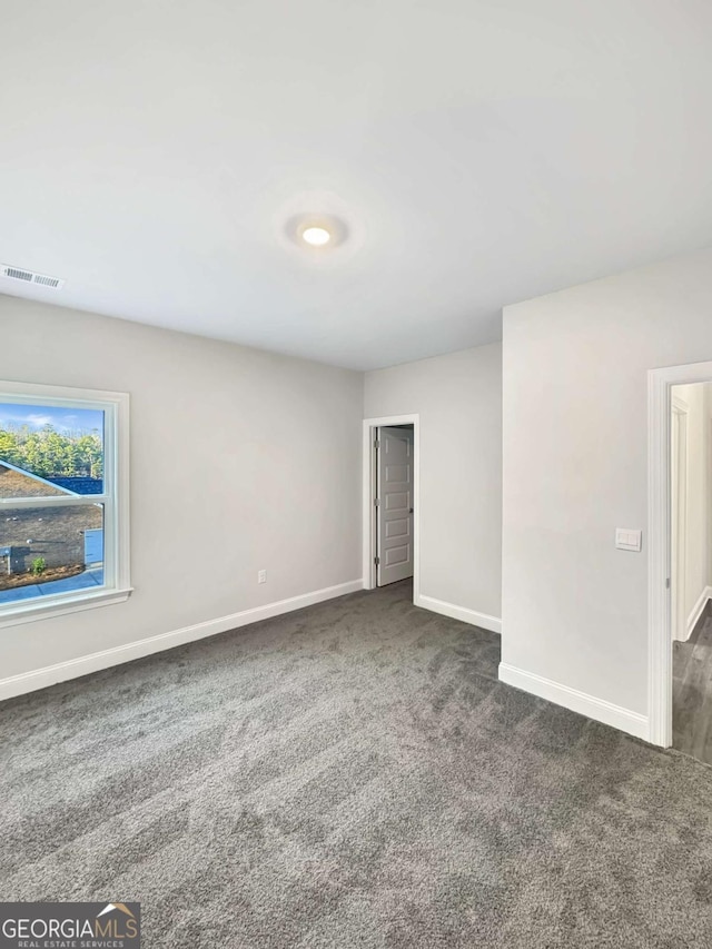 5331 Tuscany Dr, Douglasville, GA 30135 - unfurnished room with baseboards, carpet, and visible vents