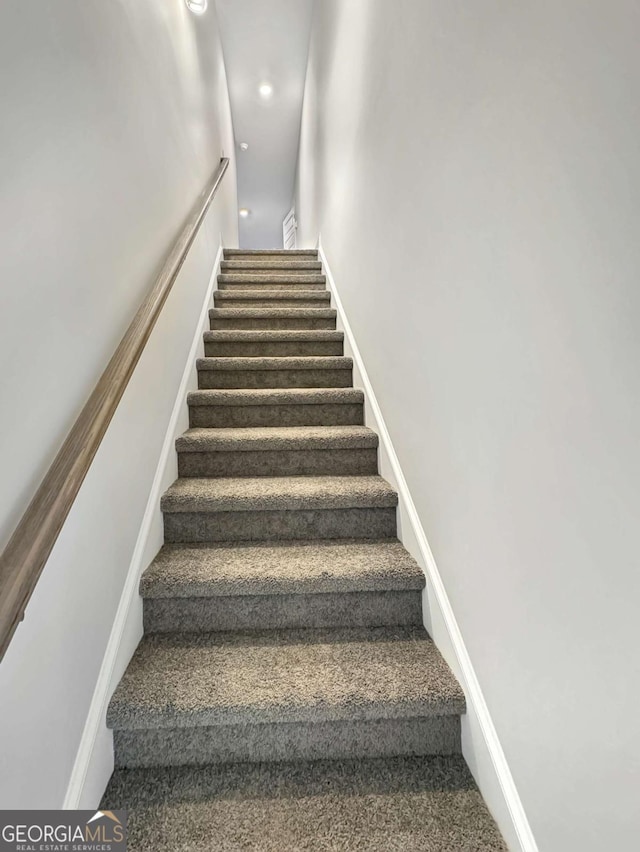 5331 Tuscany Dr, Douglasville, GA 30135 - stairs featuring recessed lighting and baseboards