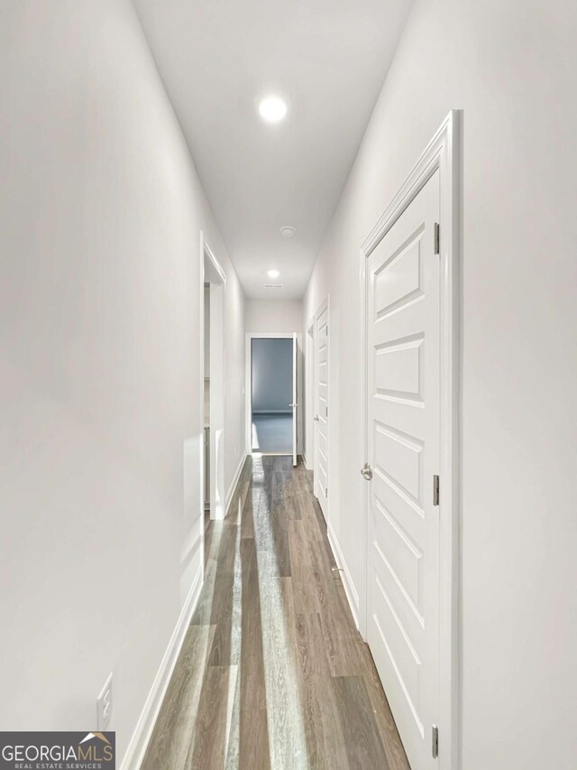 5331 Tuscany Dr, Douglasville, GA 30135 - corridor with baseboards, recessed lighting, and wood finished floors