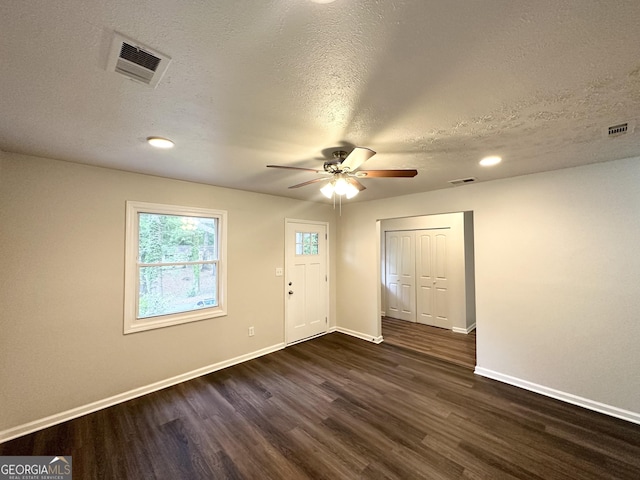 2930 Waters Rd, Atlanta, GA 30354 - foyer with ceiling fan, visible vents, and dark wood finished floors