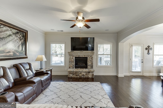 2225 Independence Ln, Buford, GA 30519 - living room with arched walkways, a ceiling fan, healthy amount of natural light, and crown molding